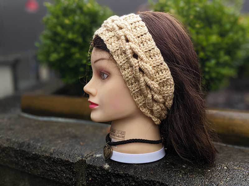 crochet cable headband on the mannequin