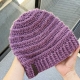 crochet beanie for women made with violet yarn