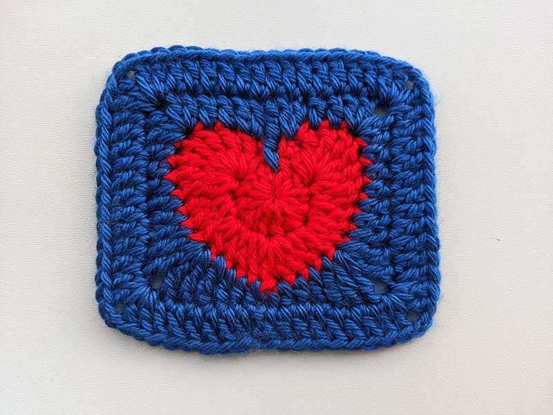 crochet navy blue and red solid heart granny square pattern