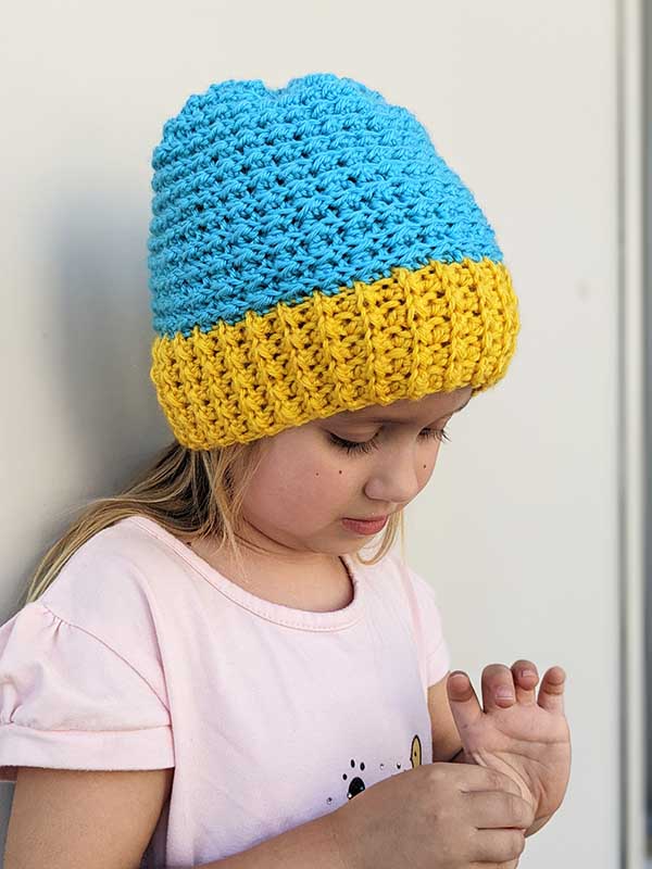toddler girl wears two color beanie