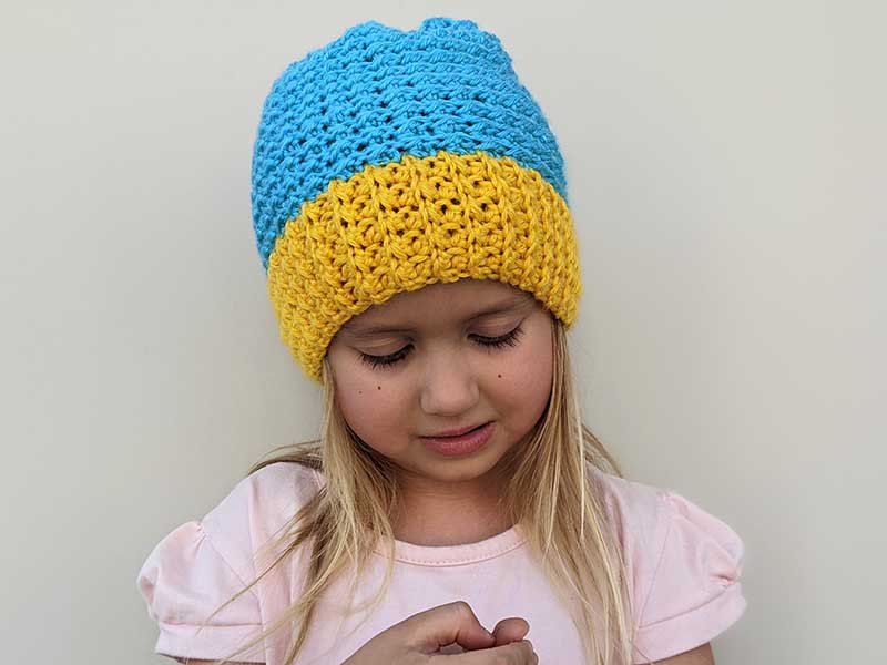two color crochet beanie on toddler model