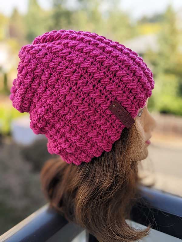 flat crochet puff stitch hat - side view