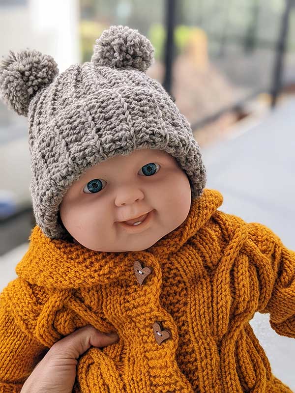 crochet ribbed beanie on baby mannequin