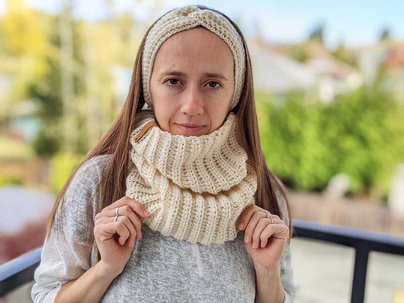 woman model wears a crochet ribbed cowl
