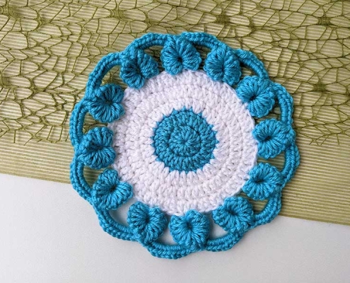 crochet round coaster pattern with hearts