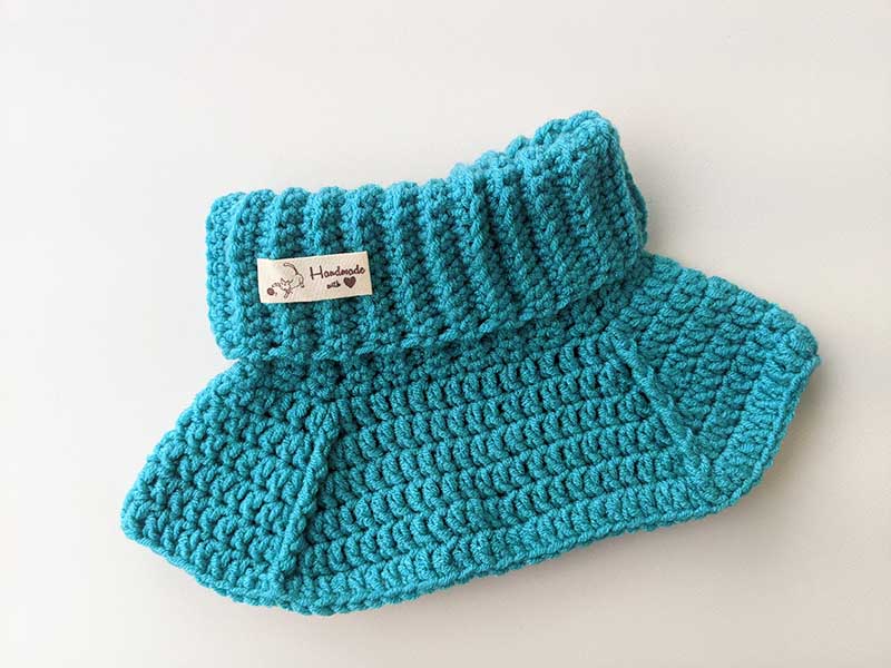 crochet baby size dickey made with blue yarn