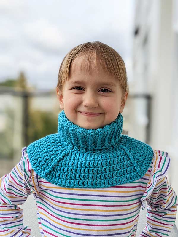 crochet turtleneck dickey on a toddler girl model