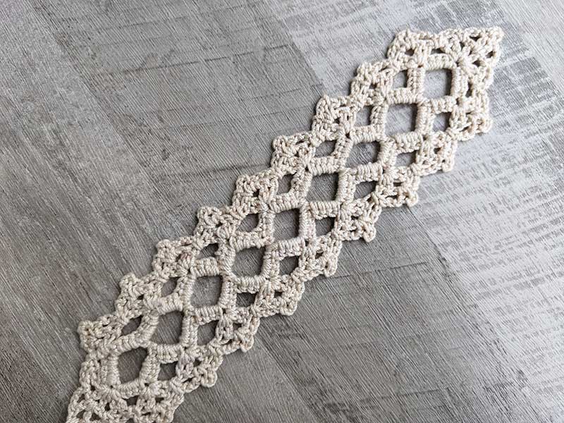 crochet lace bookmark with diamond and triangle shapes - top view