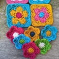 six crochet daisy flowers and four crochet daisy flower granny squares arranged in a composition