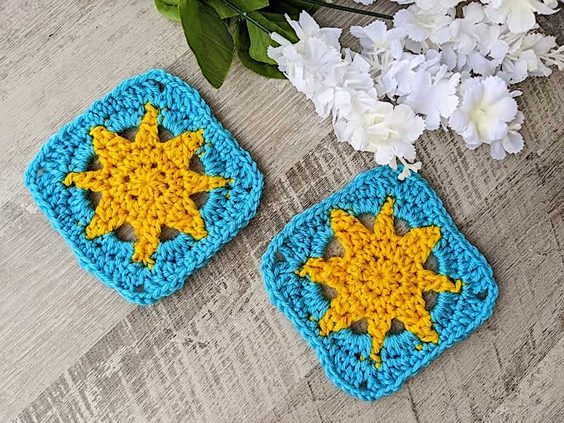 two crochet a small-sized sun granny squares made in yellow and blue colors