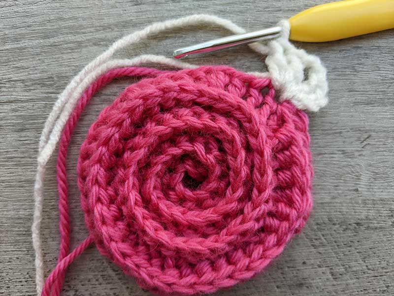 turning crochet spiral into a granny square - step one