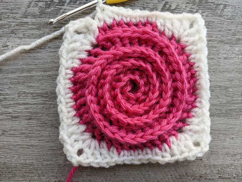 turning crochet spiral into a granny square - step three