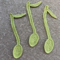 three crochet musical note bookmarks