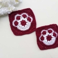 two crochet dog paw print granny squares
