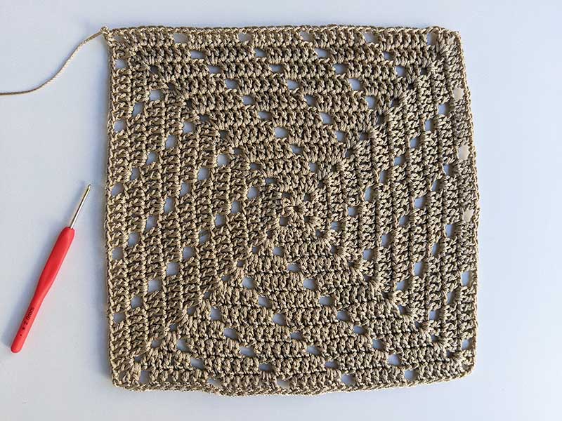 crochet basic lace granny square that can be used as a kitchen pad