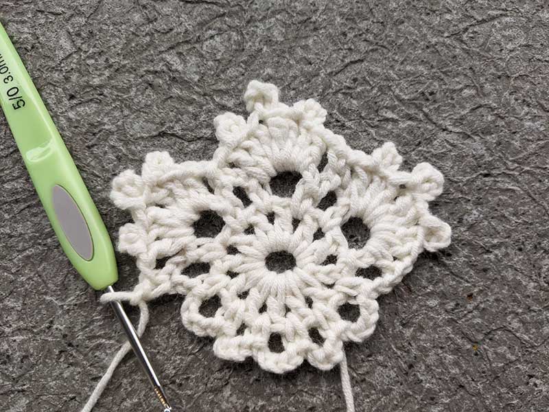 crochet lace snowflake photo tutorial - round three, step eight