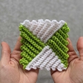 crochet textured granny square shot on hands, top view