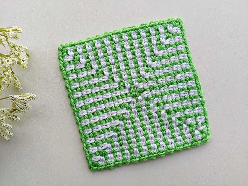 green and white crochet moss stitch granny square