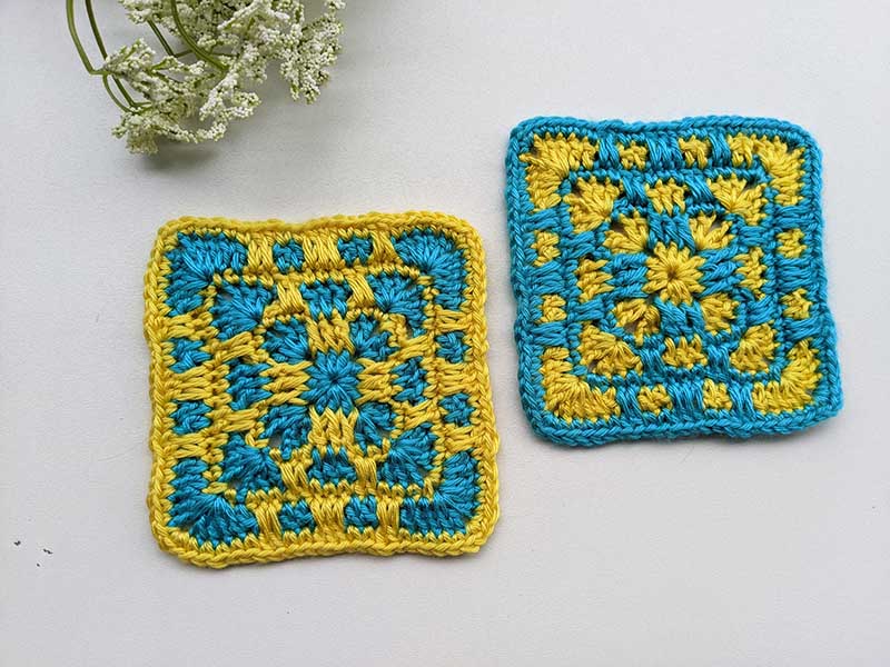 two crochet mosaic granny squares made with inverse colors - yellow & blue vs blue & yellow
