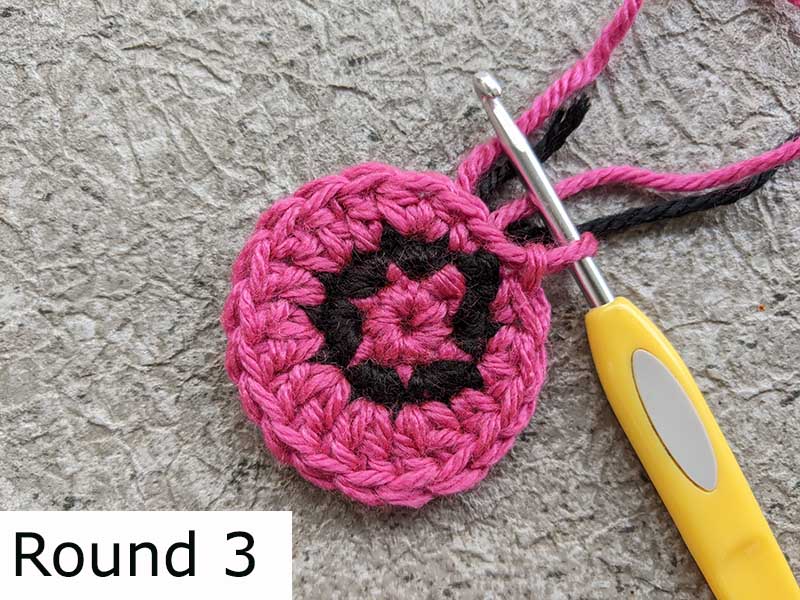 crochet flat two-color rose - round three