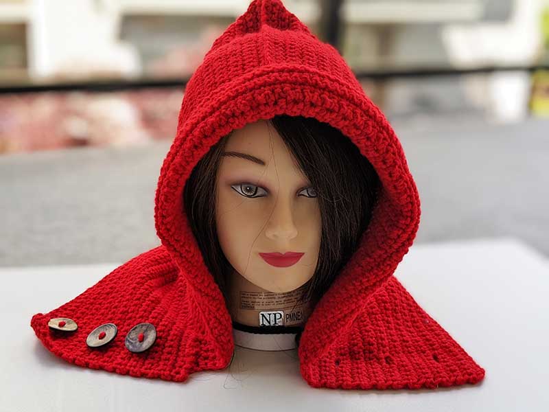 unbuttoned crochet little red riding hood on the mannequin