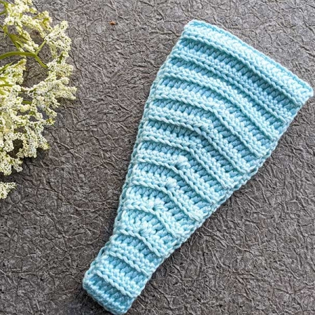 crochet headband with button closure - side view