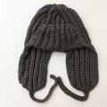 crochet trapper hat for men and women - front view on a flat surface