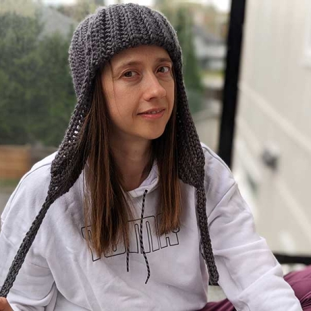 crochet women's trapper hat on a female model