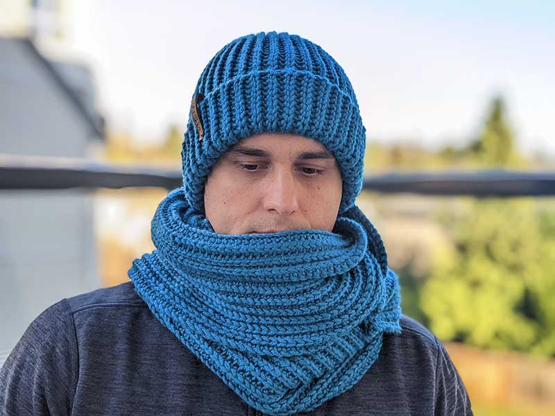 crochet blue men's hat with double brim and scarf on male model - front view