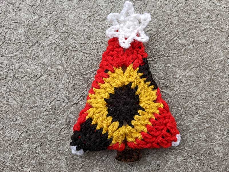 crochet Christmas tree with a star made out of a granny square