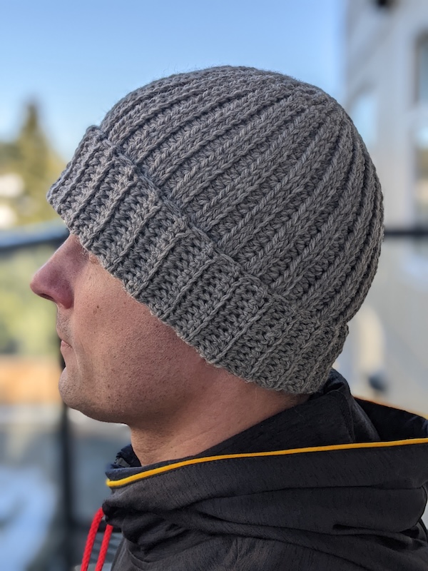 crochet hat for men on a male model