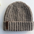 crochet nordic trail men's hat on a flat surface