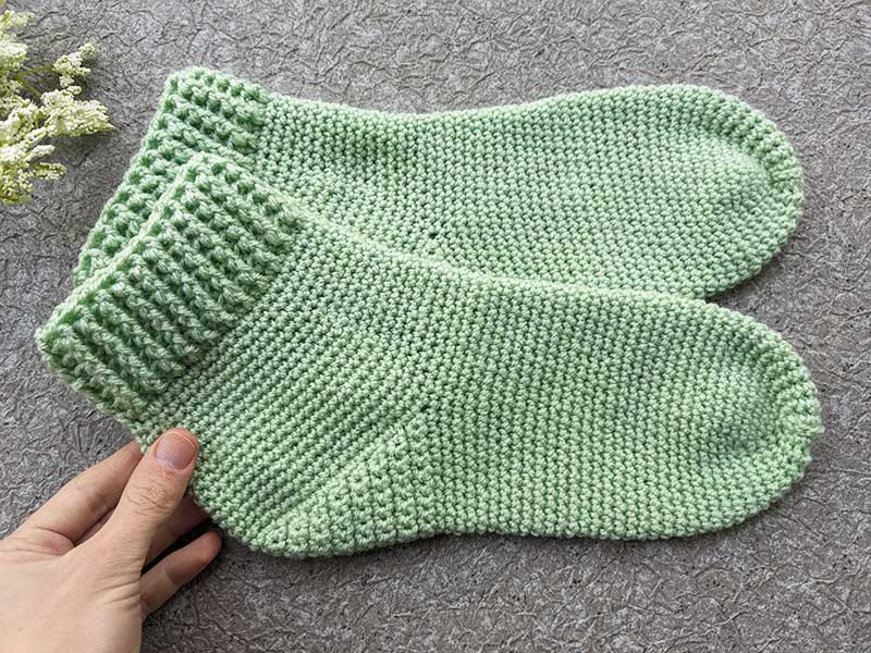 a pair of crochet beginner-level socks