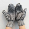 crochet woman's flat mittens - palm side view on female hands