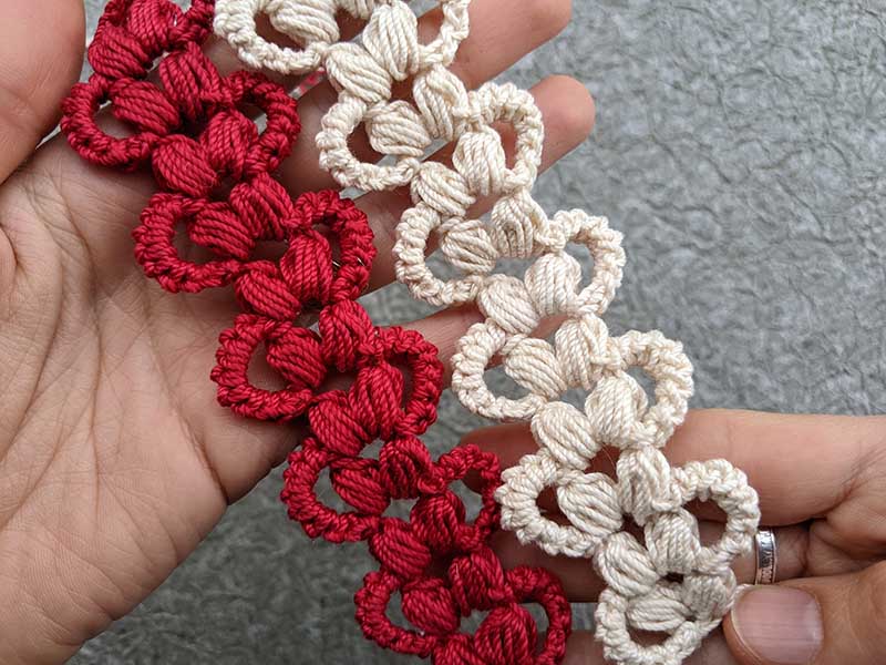 crochet two airy laces made in white and red colors