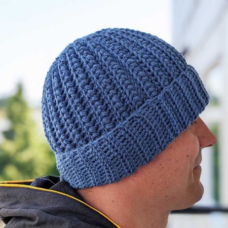 crochet nomad beanie on a male model - right side view