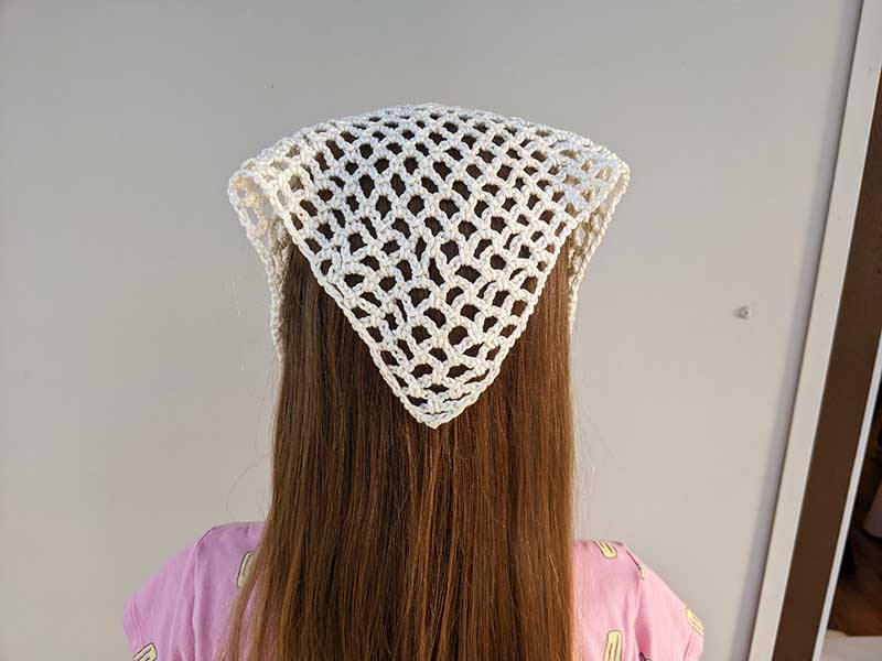 crochet summer bandana on a female model - backside view
