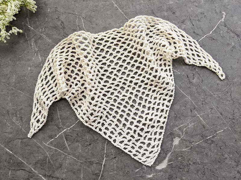 crochet summer bandana on a flat surface