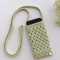 android phone in a crochet shoulder bag