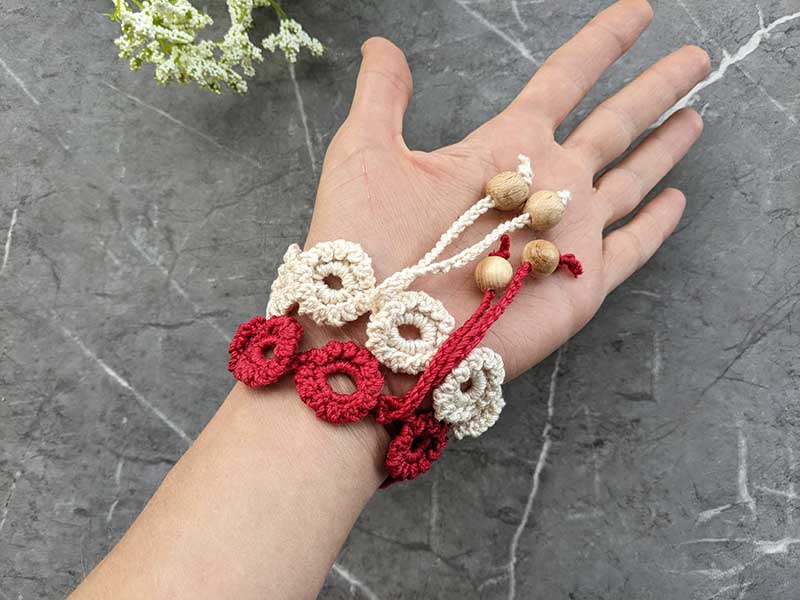 crochet lace bracelet on the female's wrist