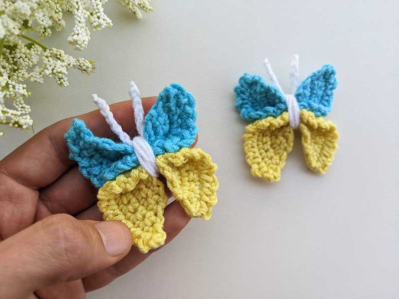 close up view of a crochet decor butterfly