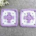 crochet motif granny with a centrally places cross that has equal width and length of the stem and crossbar