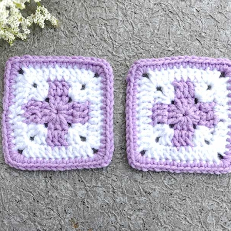 crochet motif granny with a centrally places cross that has equal width and length of the stem and crossbar