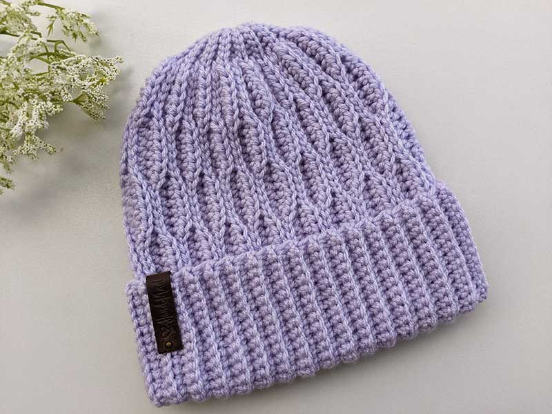 crochet ripple hat shown on a flat surface