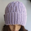 crochet ripple hat on the mannequin's head - front side view