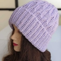 crochet ripple hat on the mannequin's head - left side view