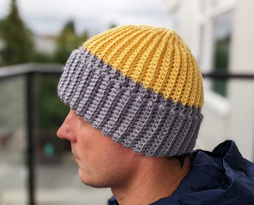crochet pattern of a two-color hat for men