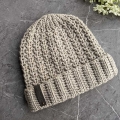 crochet modern textured hat on the flat surface