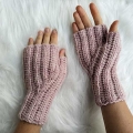crochet wrist warmers on the female hands