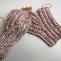 crochet wrist warmers - one finished and one not finished